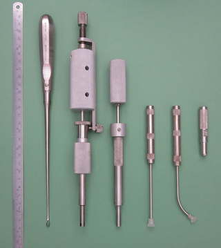 The instruments for setting from left to right: The curette, the crown mill and the front mill are displayed, which were described by Schwarz et al. [<em class="ref">17</em>] more in detail.